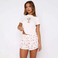 White fox shorts sweetheart pajamas printing suit featuring a white short-sleeved crop top with cactus and cowboy boot graphic
