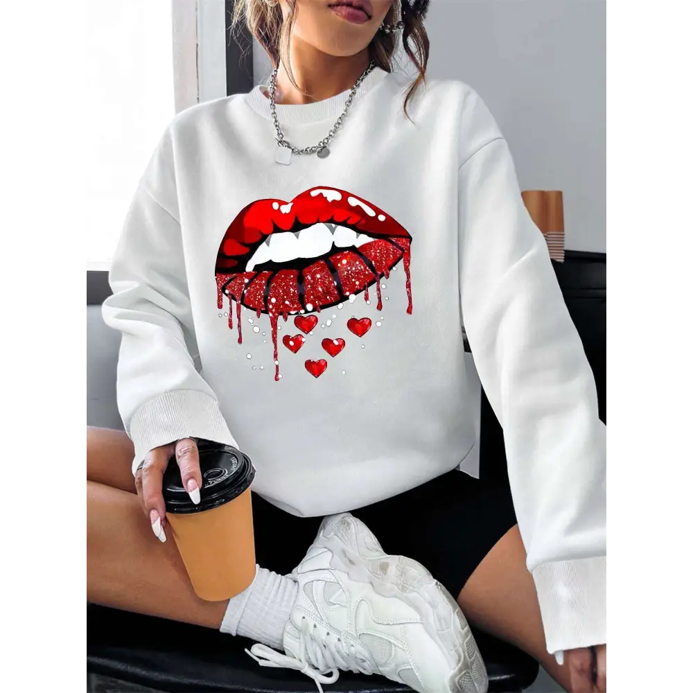 White pocketed long sleeve sweatshirt featuring bold red glitter lips graphic dripping with hearts design