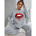 Gray pocketed long sleeve sweatshirt featuring bold red white glitter lips graphic with dripping effect and small hearts below