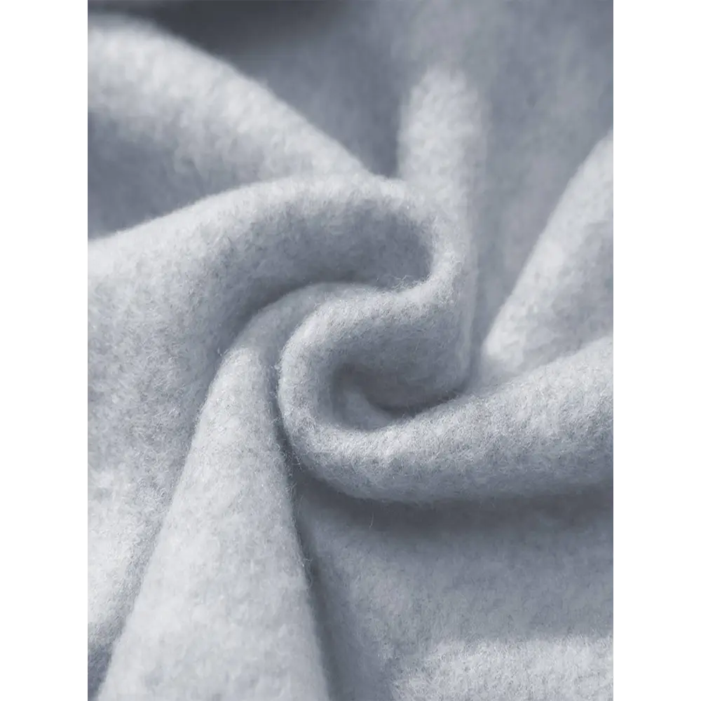 Soft light gray woolen fabric of a white glitter lips pocketed long sleeve sweatshirt featuring a plush textured surface