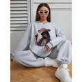 Gray oversized long sleeve sweatshirt with vibrant graphic leopard hat featuring woman in sunglasses design