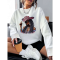 White long sleeve sweatshirt featuring a graphic leopard hat print of a woman in pink sunglasses