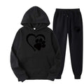 Black hoodie and sweatpants set with white heart paw printed design on front and left leg in paw printed hoodie sets