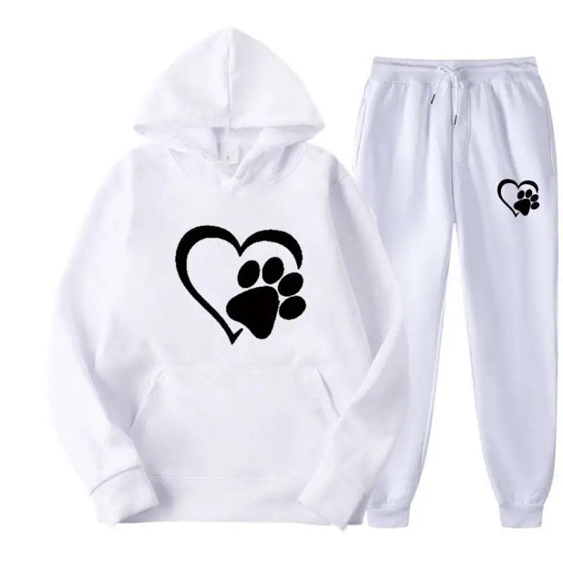 White heart paw printed hoodie sets featuring a white hoodie and sweatpants with black heart and paw designs
