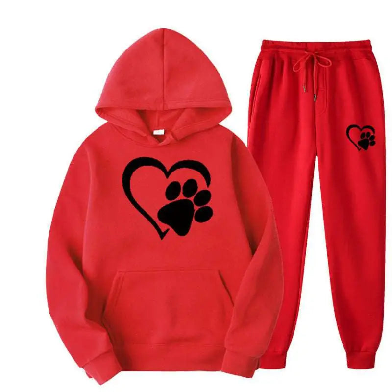 Red hooded sweatshirt with black heart and paw print design paired with matching red joggers from white heart paw printed hoodie sets