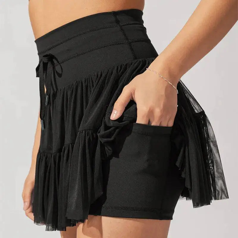 Black athletic waist pleated skirt with ruffled layers sheer mesh overlay and drawstring waistband for safety pants summer use