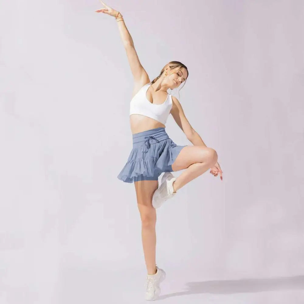A light blue waist pleated skirt with ruffles and a drawstring waistband designed as safety pants summer wear