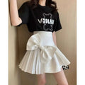 White high waist slimming pleated skirt with large satin waist slimming bow and chic mini skirt length
