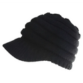 Black knitted women ponytail beanie with ribbed texture and short brim suitable for outdoor wear