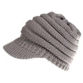 Gray knitted women ponytail beanie with structured brim and ribbed texture suitable for brim use