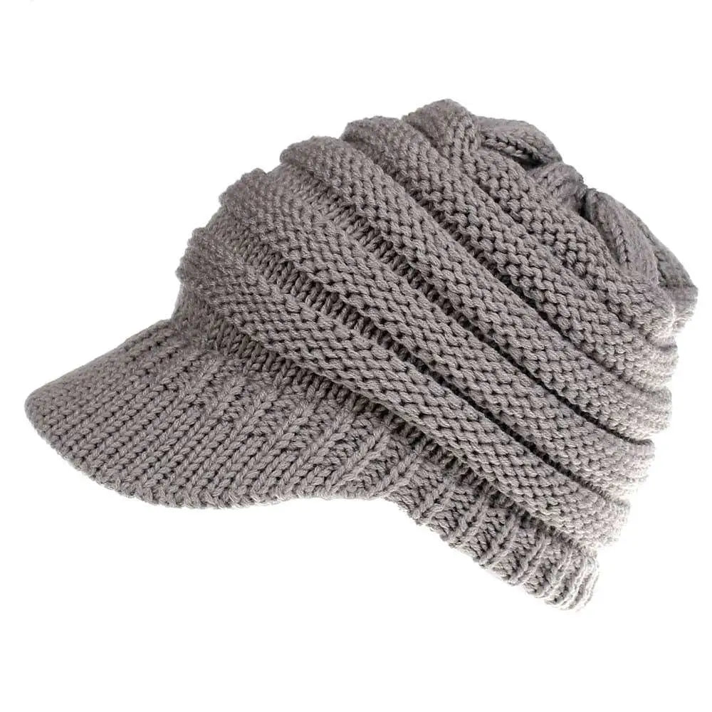 Gray knitted women ponytail beanie with structured brim and ribbed texture suitable for brim use