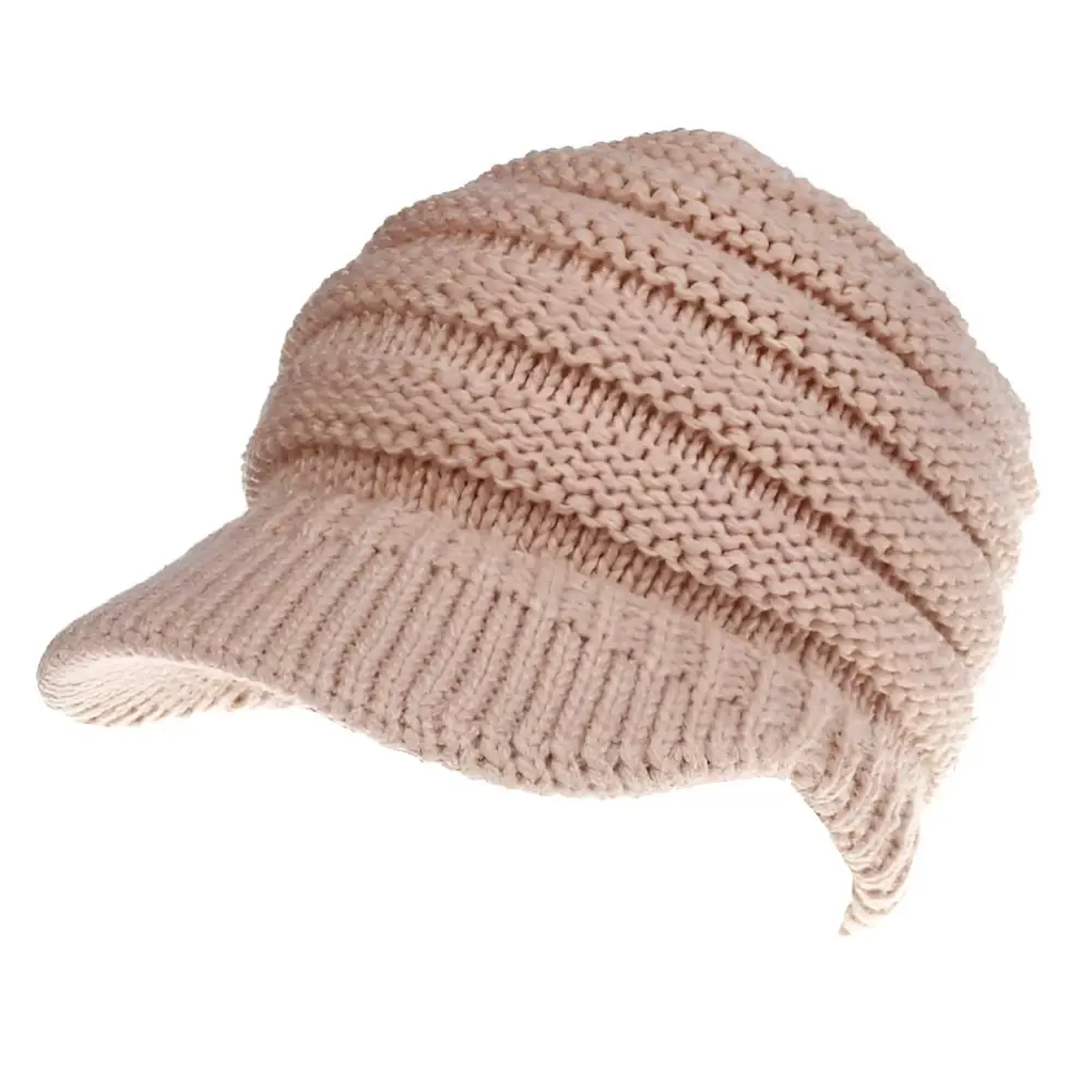 A soft beige knitted women ponytail beanie with a structured brim and ribbed texture suitable for brim use