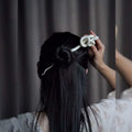 White knotted rope retro style hairpin featuring an intricately coiled snake design for elegant hair styling