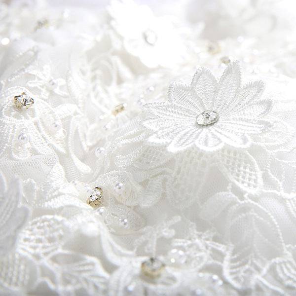 white lace fabric with delicate floral embroidery and sparkling rhinestone accents ideal for wedding dress and flower girl bridal party outfits