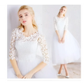 White lace floral wedding dress with three-quarter length small sleeves made of tulle for elegant occasions