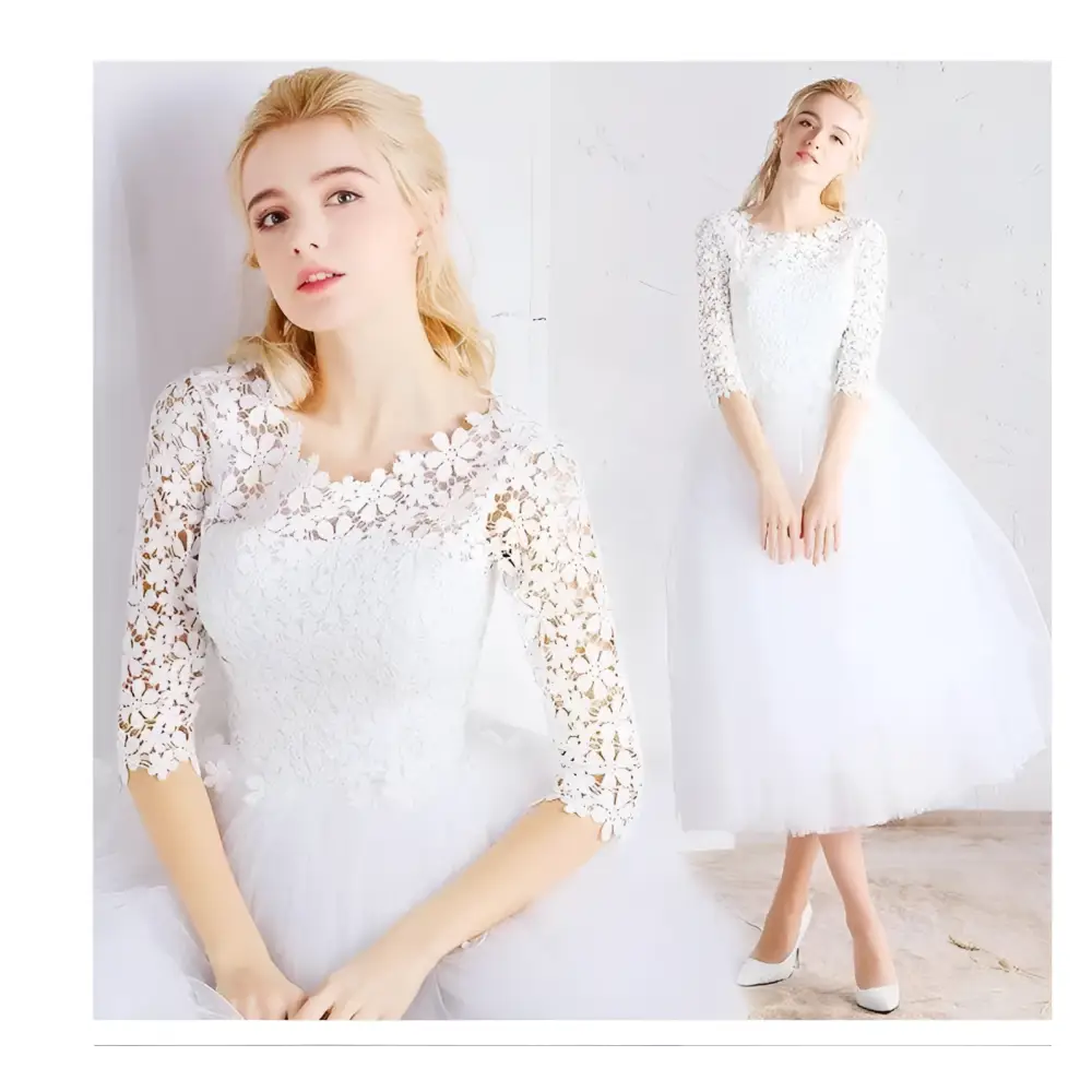 White lace floral wedding dress with three-quarter length small sleeves made of tulle for elegant occasions