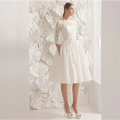 White lace floral wedding dress with three-quarter small sleeves and a flared skirt for party occasions
