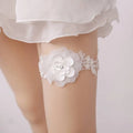 White lace floral wedding supplies elastic leg ring featuring a lace garter with floral appliqué and rhinestone center