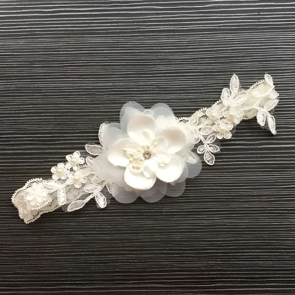 White lace floral wedding supplies elastic leg ring featuring a lace garter with floral appliqué and rhinestone center