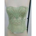 A delicate mint green lace hollow party club corset clothing with intricate circular and fan-shaped patterns