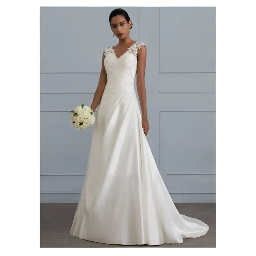 A flowing white lace satin a-line wedding gown with delicate lace shoulders and back featuring a v-neckline mso-font-pitch variable