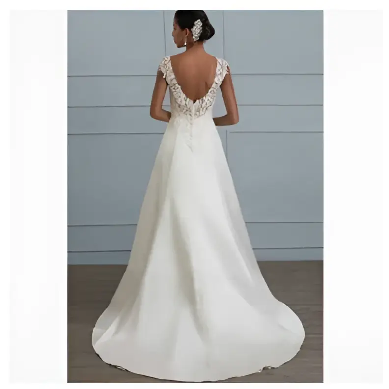 White lace satin a-line wedding gown with a flowing satin skirt and intricate lace back with cap sleeves shown from the back