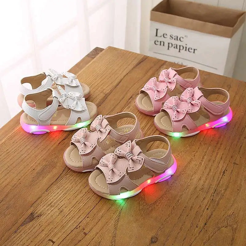 White led flashing princess shoes with pink children’s sandals featuring bows and cute flower flashing illuminated soles