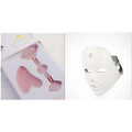 White led skin rejuvenation facial beauty device with silver metallic ear straps and small circular logo on forehead