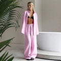 Pink linen shirt trousers suit with drawstring waist and matching oversized shirt in white linen long style