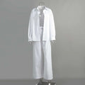 White linen long sleeve shirt trousers suit featuring a relaxed fit white cotton shirt trousers with wide-leg pants