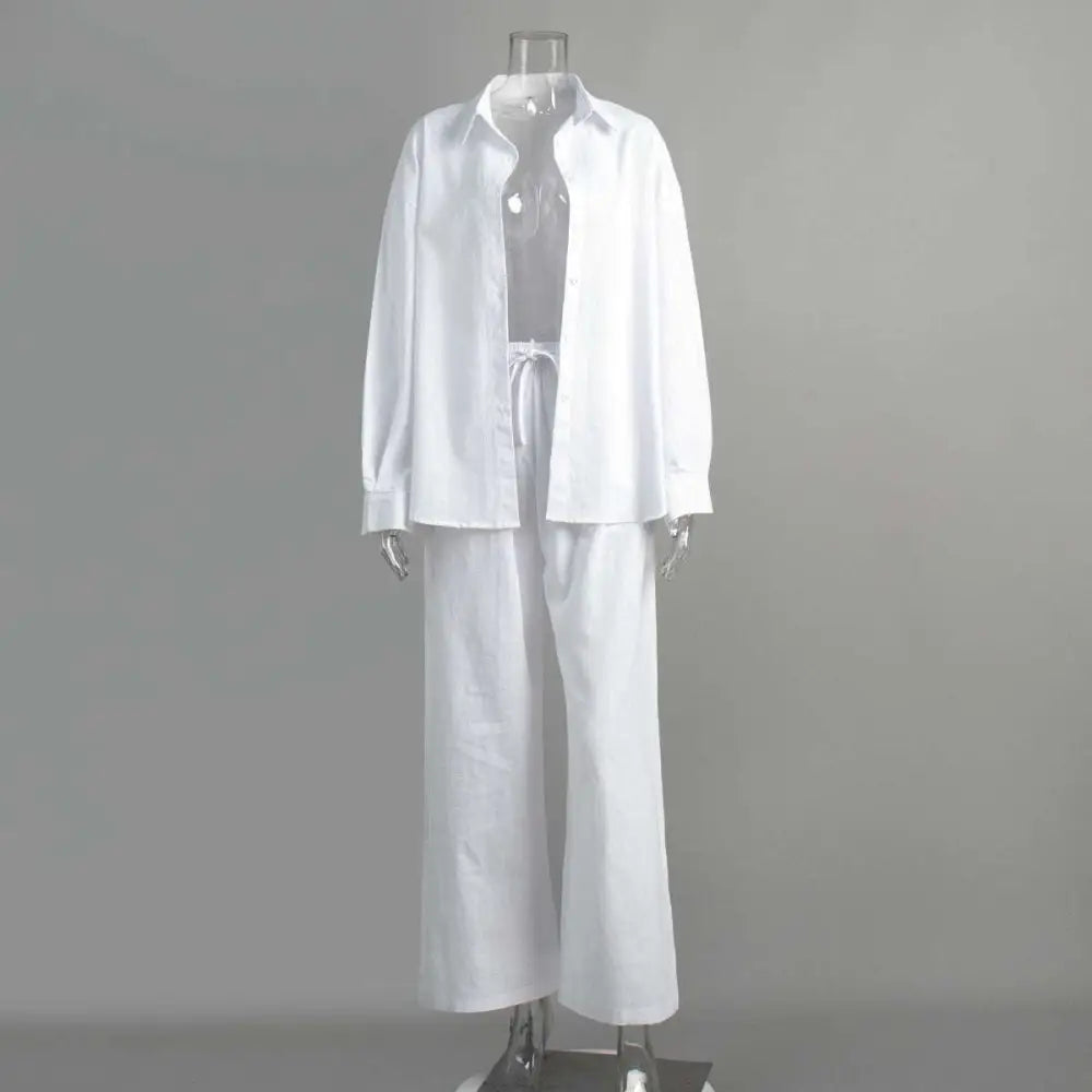 White linen long sleeve shirt trousers suit featuring a relaxed fit white cotton shirt trousers with wide-leg pants