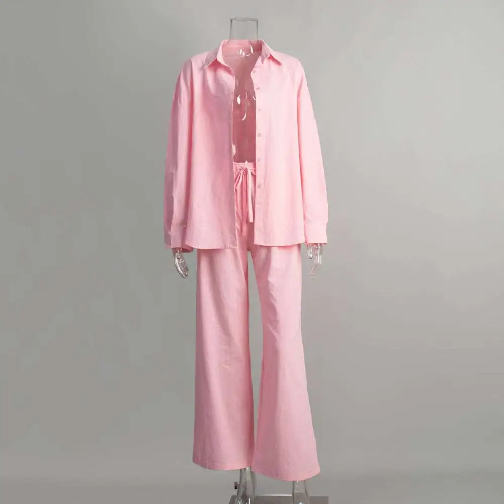 Pink cotton shirt trousers suit featuring a button-up shirt and wide-leg pants in a coordinated set