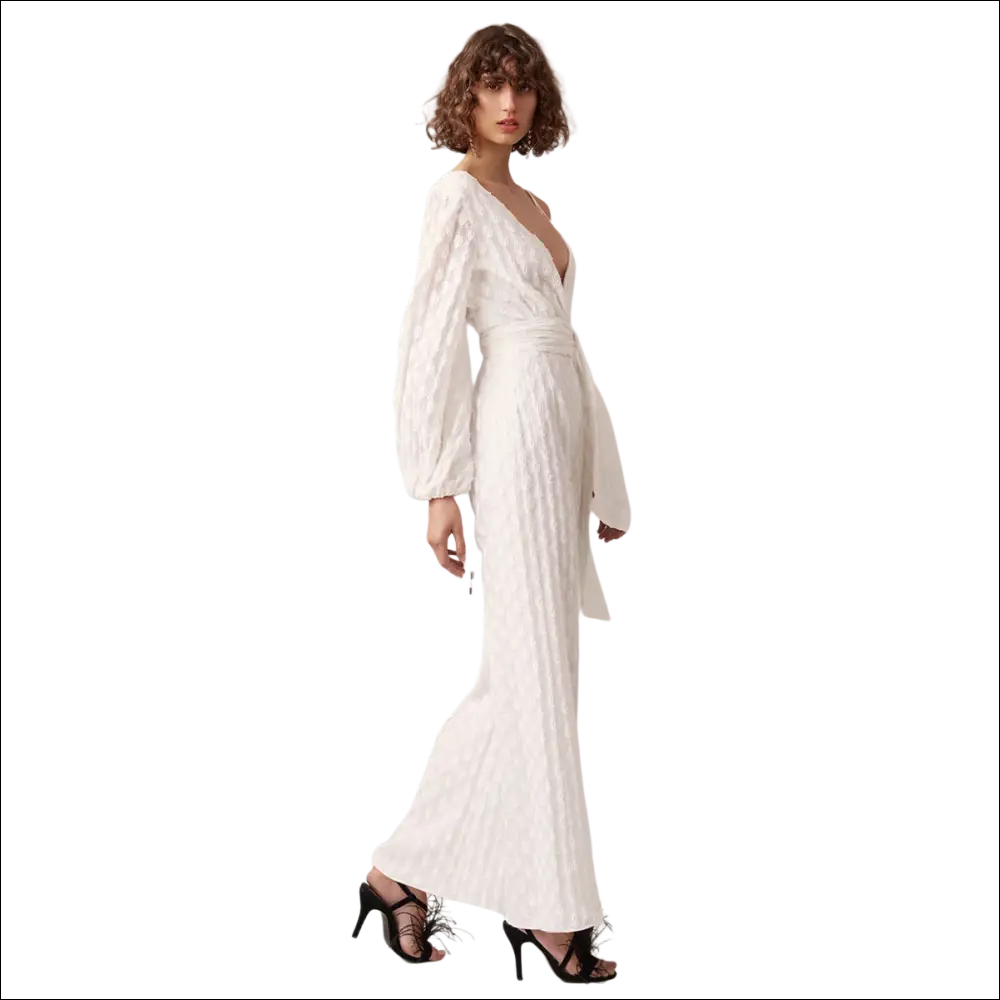White luxury women’s fashion jumpsuit with flowing white textured maxi dress style and voluminous sleeves luxury jumpsuit image