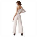 White luxury women’s fashion jumpsuit with textured fabric, one-shoulder design, sheer polka-dot sleeves, and belted waist jumpsuit image