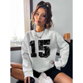 White number 15 graphic crew neck sweatshirt with black distressed marble textured print and ribbed knit cuffs