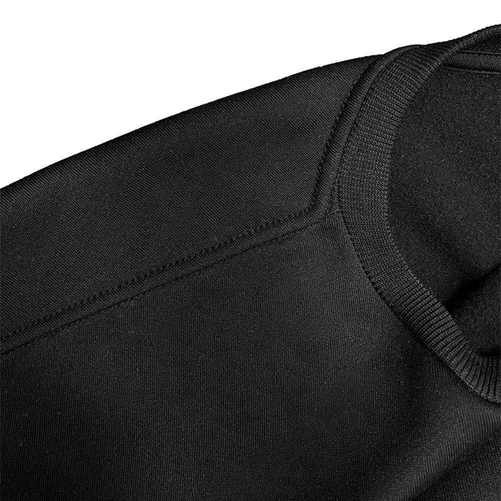 Black ribbed knit crewneck sweater with smooth textured fabric and neatly stitched seams for graphic crew neck style
