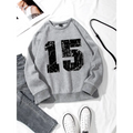 Gray graphic crew neck sweatshirt with black distressed 15 print and ribbed knit collar and cuffs