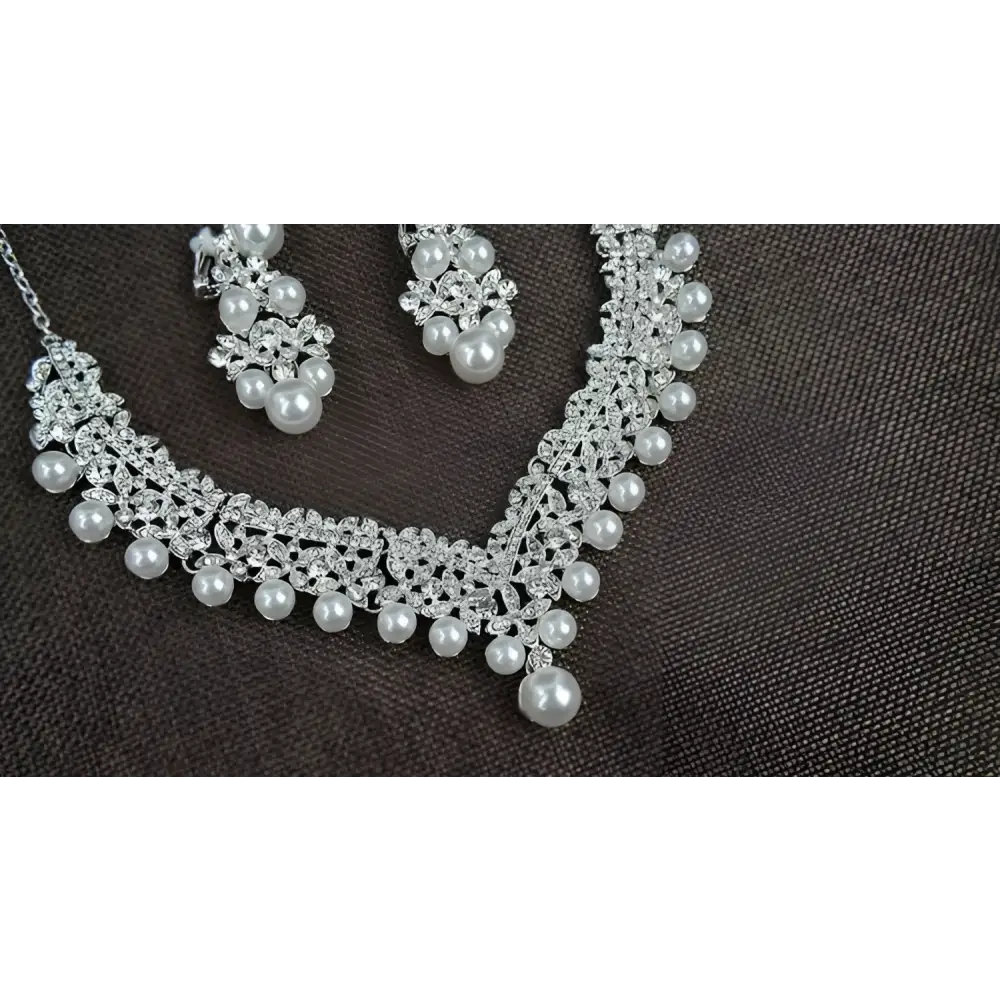 Silver white pearl necklace diamond with intricate filigree design and rhinestones in diamond suit bridal set