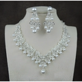 White pearl necklace diamond suit bridal set with silver and white pearls and intricate crystal detailing