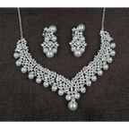 Silver white pearl necklace diamond suit bridal set with intricate crystal embellishments and matching earrings