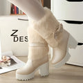 Cream-colored platform sweet bow boots with faux fur lining and matching ankle bow detail for stylish winter wear