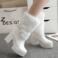 White platform sweet bow boots featuring fluffy faux fur cuffs and satin bow detail for stylish winter wear