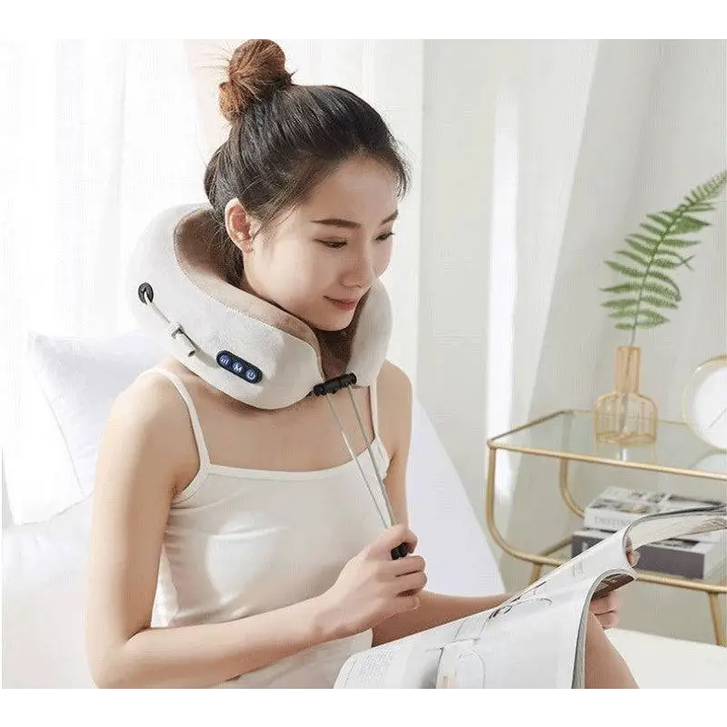 White plush u shaped massage pillow neck device with control buttons and adjustable straps for comfort