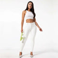 White pu leather high waisted skinny pants in white featuring leather fitness pants design for a sleek fit