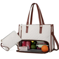 White quilted insulated lunch bag with leather trim and brown straps featuring a spacious interior with snacks and produce