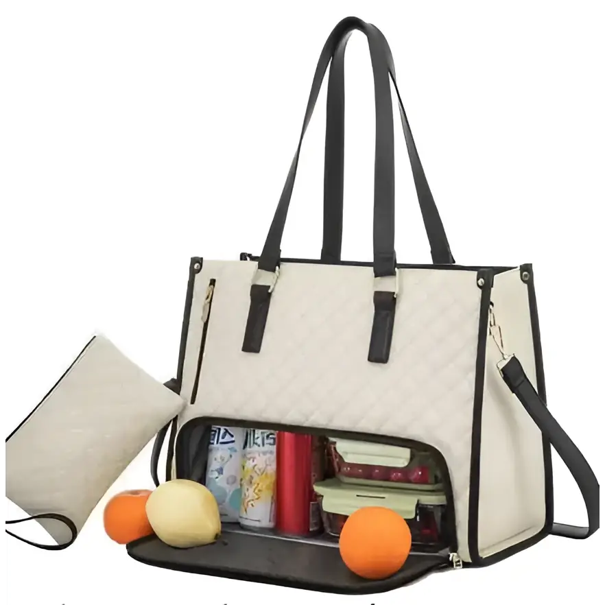 Beige quilted insulated lunch bag with leather trim and black handles featuring spacious interior with food containers