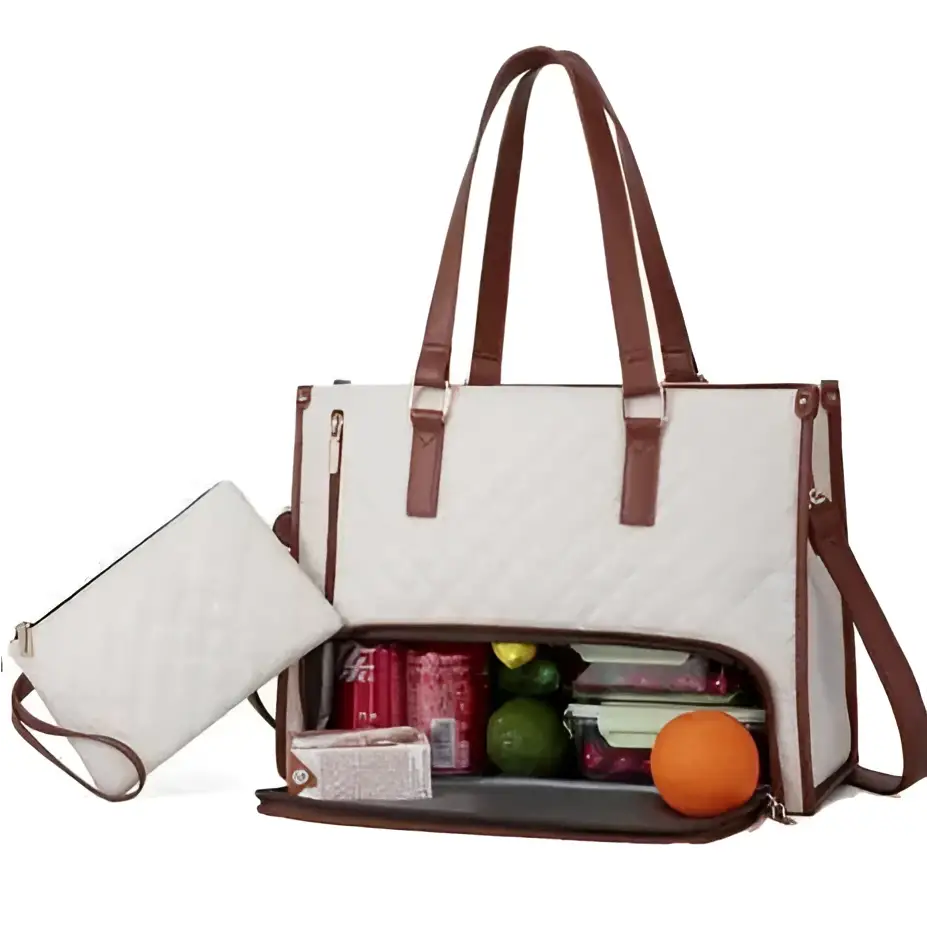 White quilted insulated lunch bag with leather trim and brown straps featuring spacious interior with snacks and produce