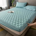 Light blue quilted waterproof mattress protector with diamond pattern and elastic edge for kids white quilted waterproof