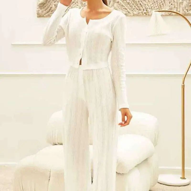 White ribbed knit fashion cardigan with long sleeves button front and square neckline in ribbed knit material