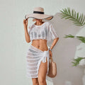 White ribbed knitted beach bikini set with sheer crochet fabric ruffled sleeves and tied wrap skirt for beachwear